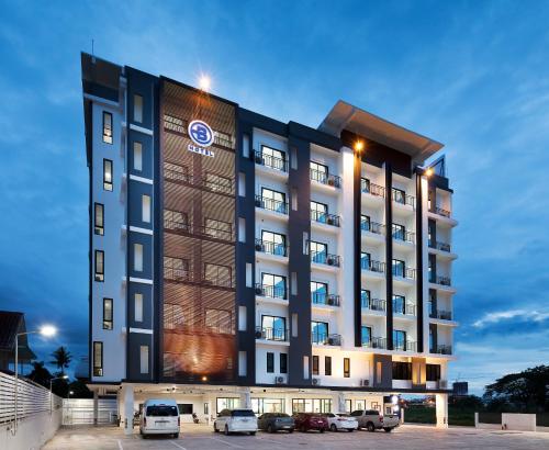 a rendering of a hotel with cars parked in a parking lot at B Hotel in Khon Kaen