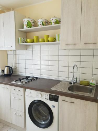 Majoituspaikan Lima C keittiö tai keittotila