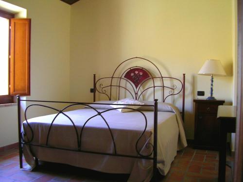 Katil atau katil-katil dalam bilik di Agriturismo La Cicala