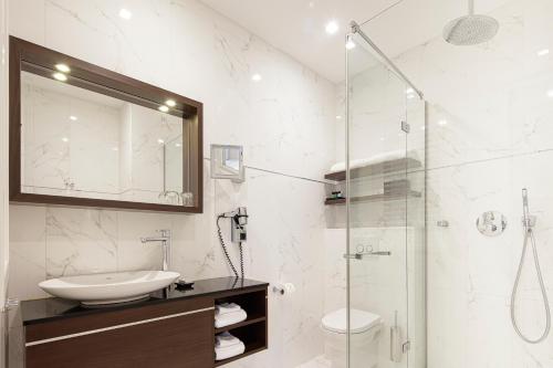 Een badkamer bij Boutique Hotel Notting Hill