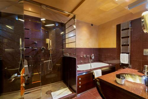 Ett badrum på Ca' Pisani Hotel