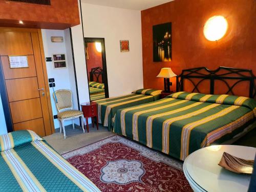 Una cama o camas en una habitación de Hotel Feel Inn Venice Airport