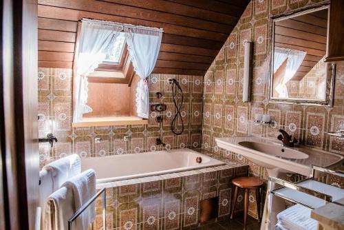 Baðherbergi á Ferienhaus im Weingarten