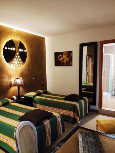 Una cama o camas en una habitación de Hotel Feel Inn Venice Airport