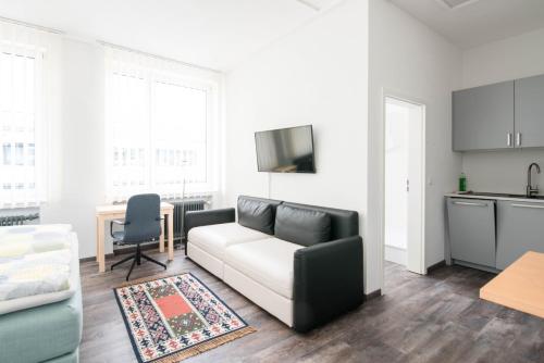 Гостиная зона в Central Apartments Aalen