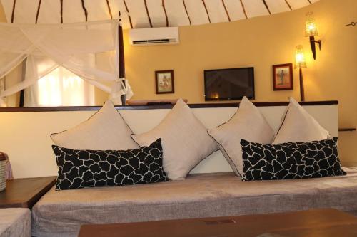 Posezení v ubytování Movenpick Resort Lamantin Saly