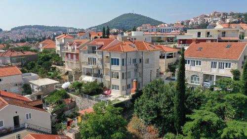 an aerial view of a city with houses at Apartments Villa Sirena in Dubrovnik