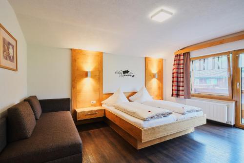 מיטה או מיטות בחדר ב-Haus Zitt