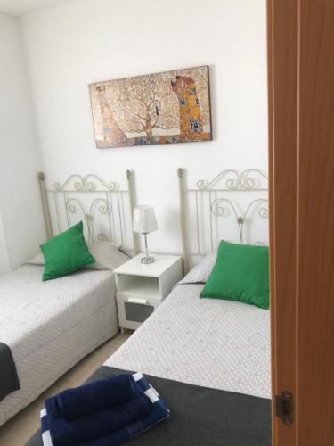 Postel nebo postele na pokoji v ubytování Apartamento Plaza España