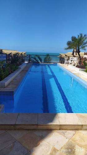 Πισίνα στο ή κοντά στο THE FOUNTAINS 110 - Apartamento em lindo condomínio pé na areia da Praia das Fontes em Beberibe - CE