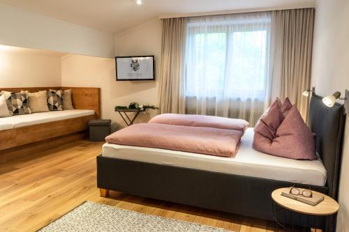 Posteľ alebo postele v izbe v ubytovaní Faustlinghof