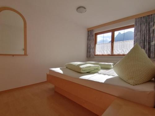 Postel nebo postele na pokoji v ubytování Haus Viola