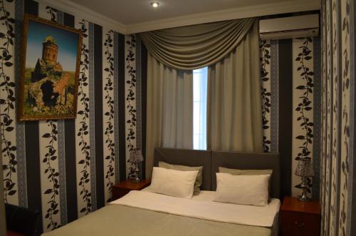 Кровать или кровати в номере Мини-отель «АНИ»