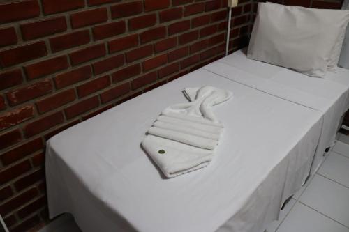 Postelja oz. postelje v sobi nastanitve Pousada Málaga