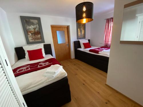 Ένα ή περισσότερα κρεβάτια σε δωμάτιο στο Residence Cosy