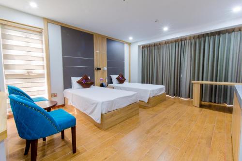 Un ou plusieurs lits dans un hébergement de l'établissement SAKURA HOTEL