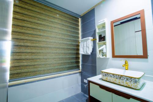 Salle de bains dans l'établissement SAKURA HOTEL