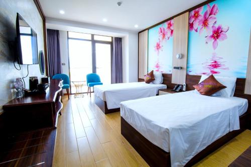 Un ou plusieurs lits dans un hébergement de l'établissement SAKURA HOTEL