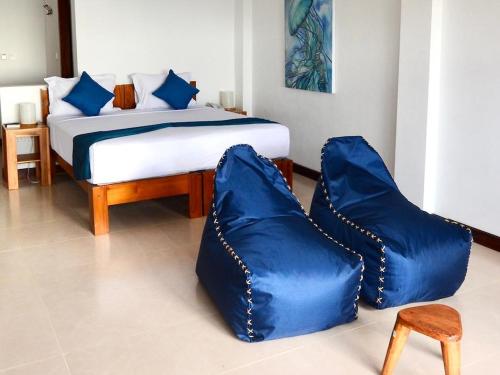 Ένα ή περισσότερα κρεβάτια σε δωμάτιο στο Sunset Hill Hotel