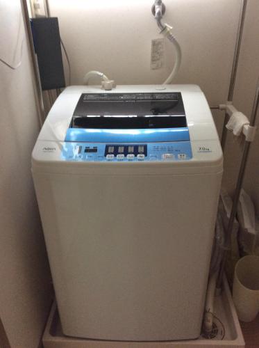 a fax machine sitting in a corner of a room at 民泊Ｒｉｋａ in Tokai