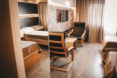 Postel nebo postele na pokoji v ubytování Hotel Druzhba