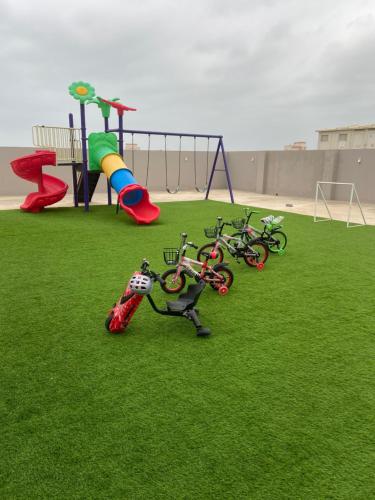 a group of bikes parked on a playground at platinum Chalet Mirbat in Mirbāţ