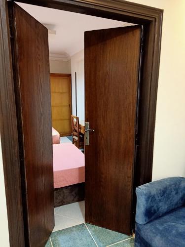 Postel nebo postele na pokoji v ubytování Jewel Mandara Apartments