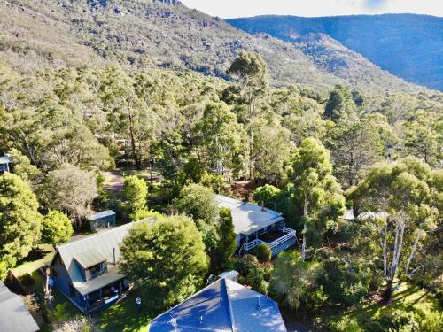 an aerial view of a house in the mountains at Cedar Country Retreat in Halls Gap