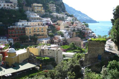 a view of a town on the side of a mountain at Casa Celidea in Positano