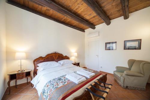 Łóżko lub łóżka w pokoju w obiekcie Palazzo Marigliano - Serviced Apartments