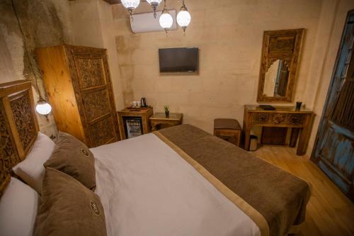 Televisyen dan/atau pusat hiburan di Sinasos Star Hotel Cappadocia