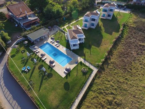 an aerial view of a house with a swimming pool at Kyparissia Blue Boutique Hotel in Kyparissia