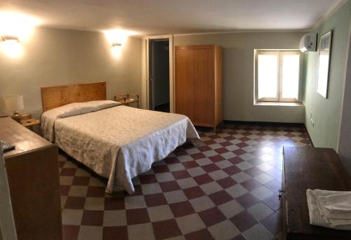 Ένα ή περισσότερα κρεβάτια σε δωμάτιο στο Chez Claudia - Relax in Catania city center