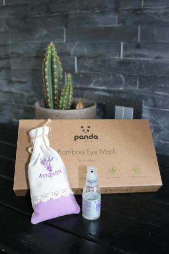 a box with a bottle of a bamboo eye mask at The Lodge in Rogaška Slatina