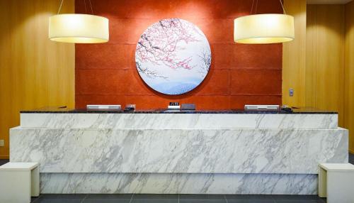 The lobby or reception area at Hotel The West Hills Mito