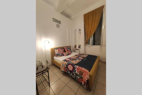 Un pat sau paturi într-o cameră la Appartement Marseille Centre 'LE NOAILLES'