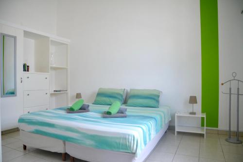 Ліжко або ліжка в номері Casa di Mario