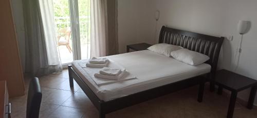 Postel nebo postele na pokoji v ubytování Apartment's Meti