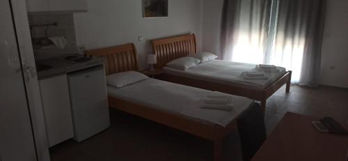 Postel nebo postele na pokoji v ubytování Apartment's Meti
