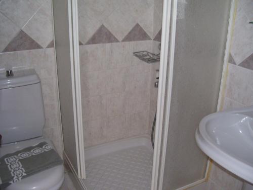 Koupelna v ubytování Aristides Hotel