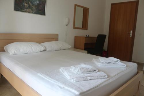 Postel nebo postele na pokoji v ubytování Apartment's Meti