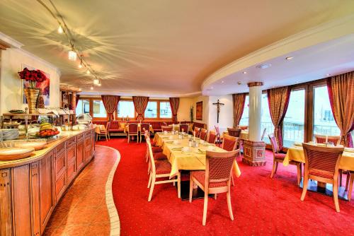Restorāns vai citas vietas, kur ieturēt maltīti, naktsmītnē Hotel Garni Urezza