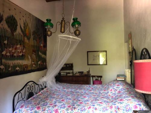 A bed or beds in a room at Casale del monte, Pesaro