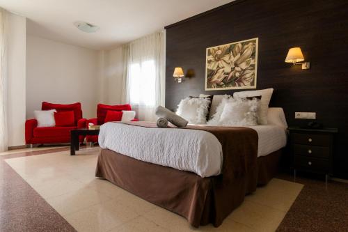 Ένα ή περισσότερα κρεβάτια σε δωμάτιο στο Hotel Guardamar