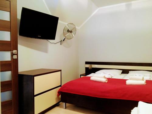 Un pat sau paturi într-o cameră la Apartament 325