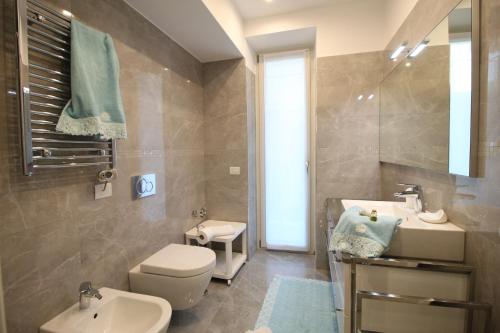 Ванна кімната в Casa Vacanze Residence Ideale Suites and Apartments