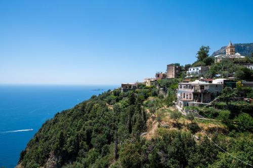 
a view from the top of a hill overlooking the ocean at Villa genny and emily in Positano
