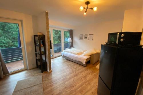 Postel nebo postele na pokoji v ubytování SUNSIDE Idyllisches Apartment am Wasser