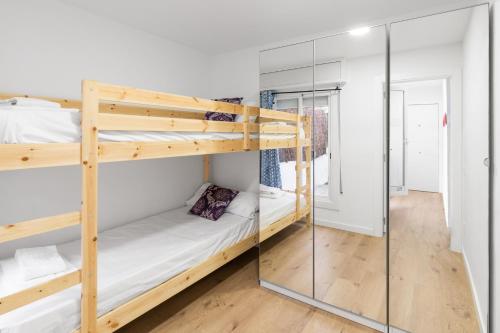 Posteľ alebo postele v izbe v ubytovaní Beach apartment IV Coeur de Plage