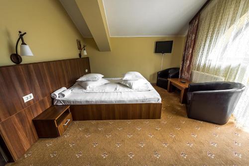 מיטה או מיטות בחדר ב-Casa Ligiana